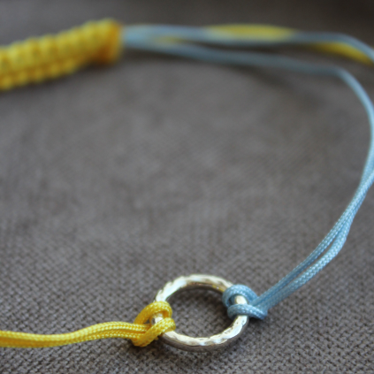 Браслет серебряный Круг Youko желто-голубой шнур