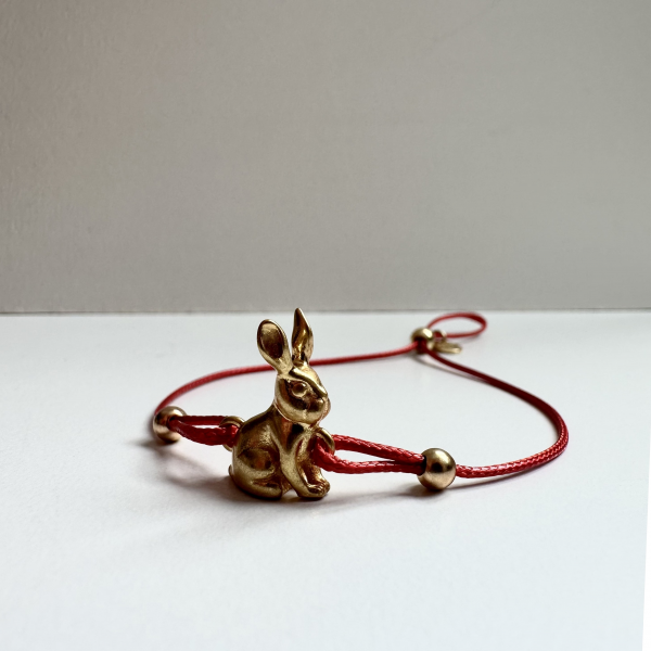 Браслет Біжутерія Кролик у позолоті Youko шнур червоний